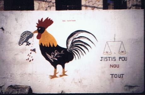 The rooster was the symbol of Aristide’s political party the National Front for Change and Democracy